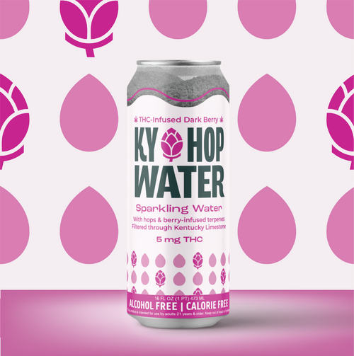 A can of Ky Hop Water Sparkling Water, 5 mg THC, standing upright on a pink surface against a light pink background with darker pink teardrop shapes.