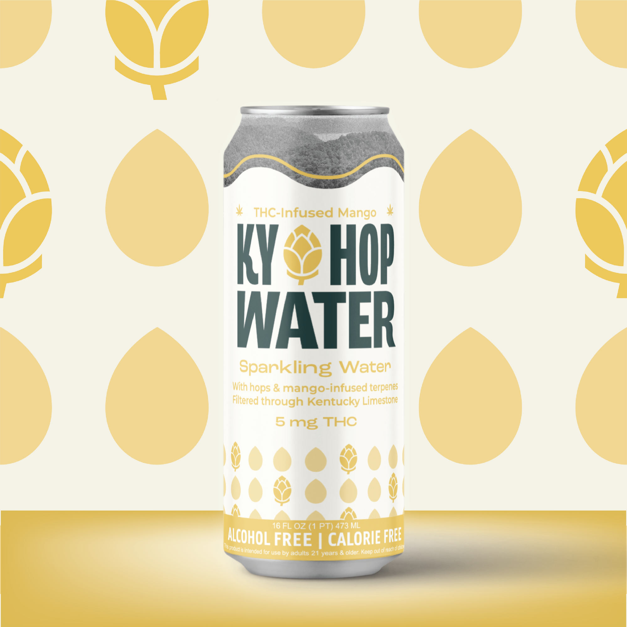 A single can of Ky Hop Water THC-Infused Mango Sparkling Water, featuring a white and gold label with dark green text, set against a matching patterned cream and gold background.