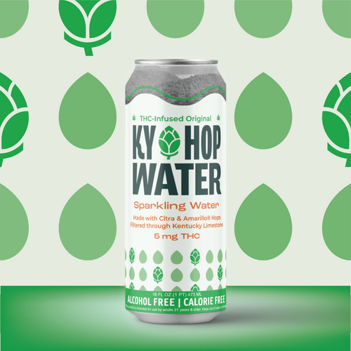 A single can of Ky Hop Water Sparkling Water, a THC-infused beverage, centered against a light green background patterned with green hop leaves. The can features a white label with green and orange text and graphics.