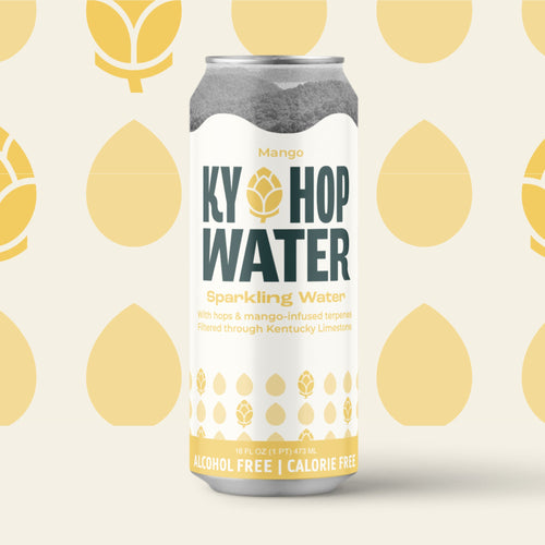A single can of Ky Hop Water Sparkling Water in Mango flavor, featuring a white label with dark green and yellow text and hop illustrations, set against a light cream background with a repeating yellow hop pattern.